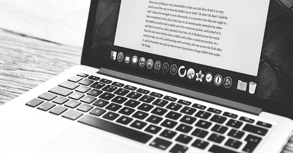 Black and white photo of a laptop screen displaying a page of text